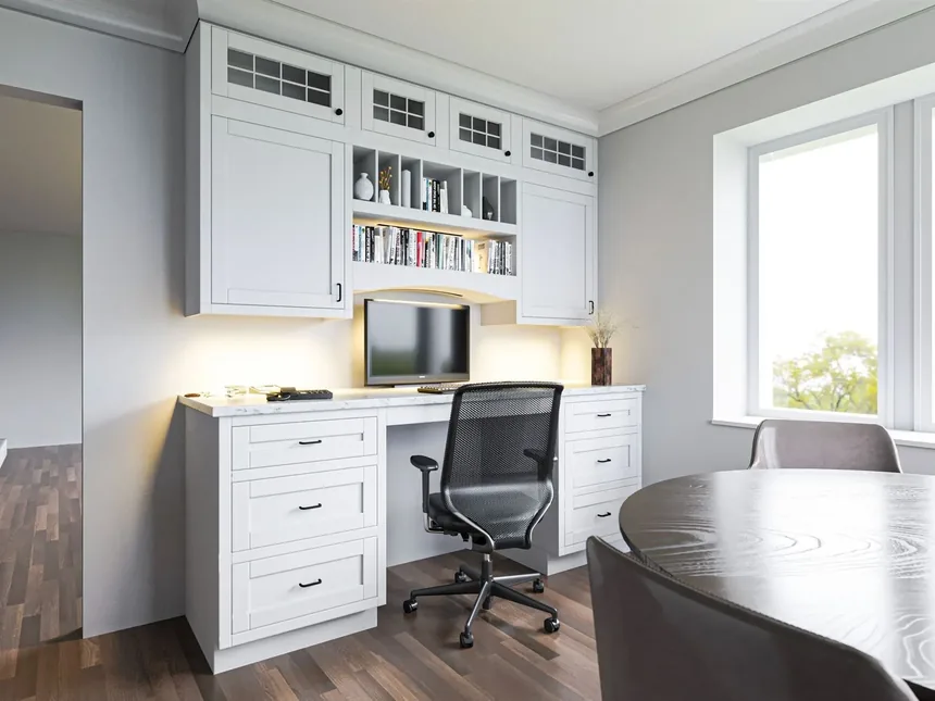 Finished lower level with white built-in cabinets and shelving