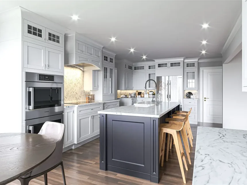 White kitchen with a dark island and wood counter stools