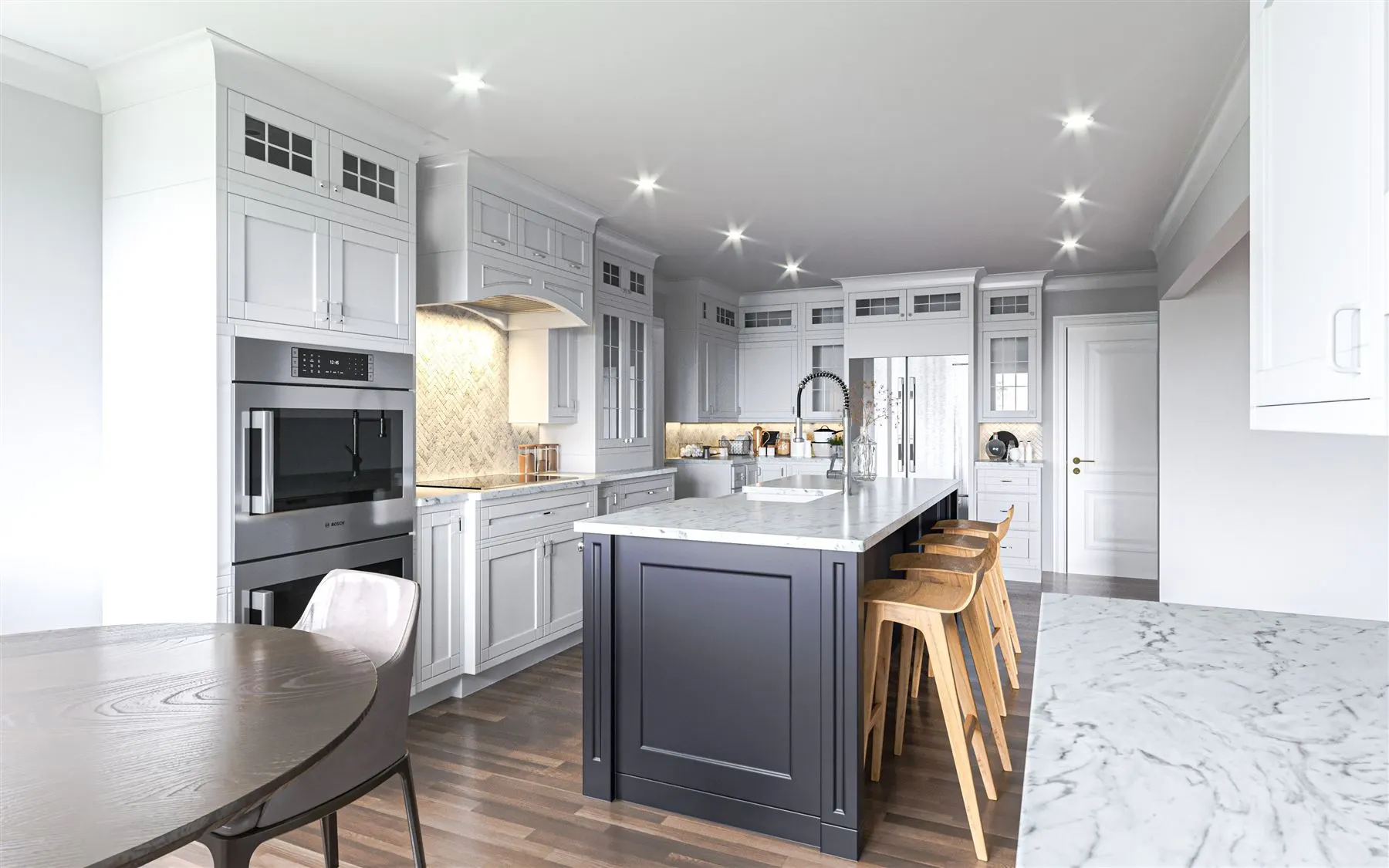 White kitchen with dark island and wood stools
