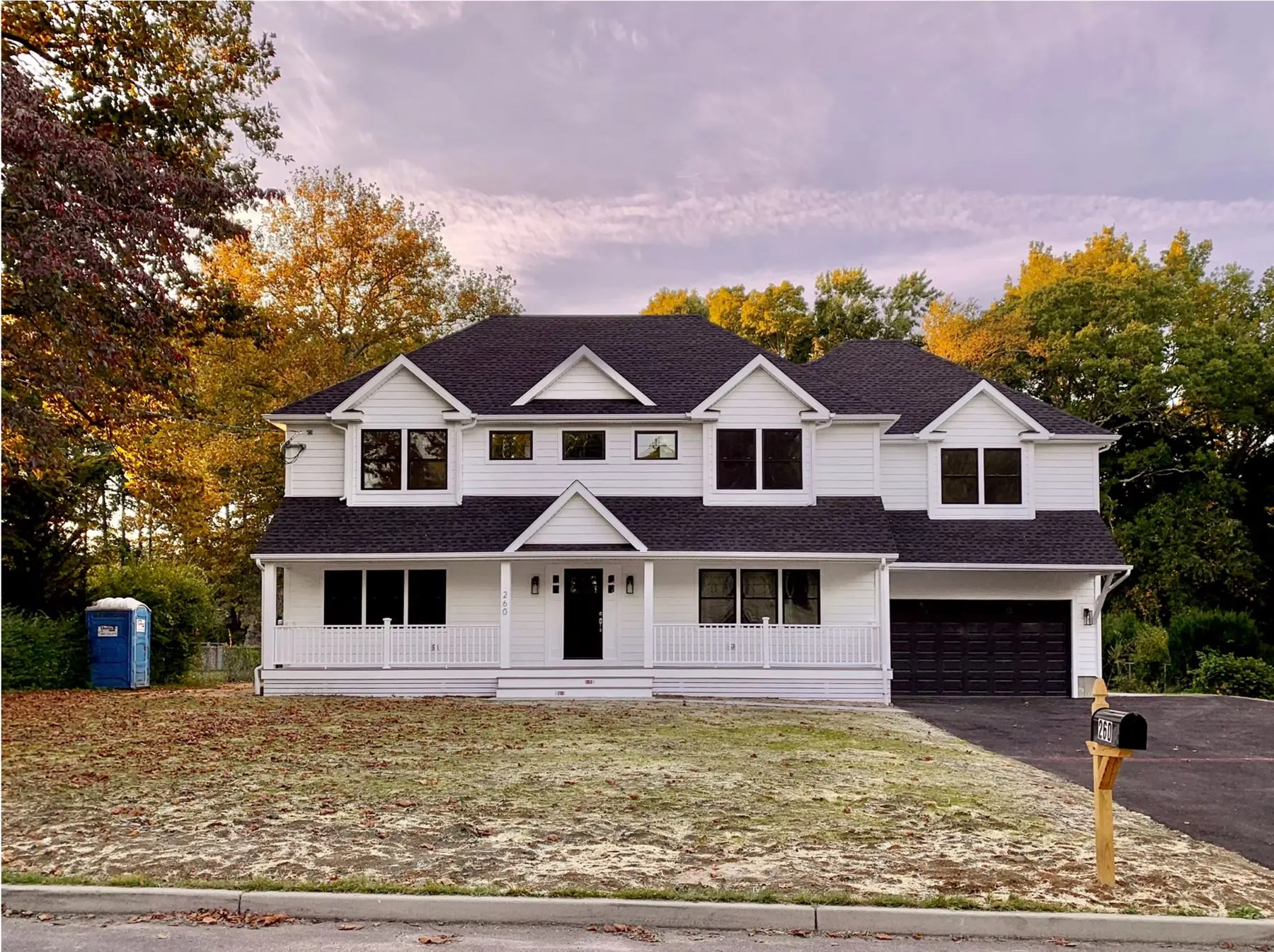 Completed white colonial home on Godfrey Road in Fairfield, CT