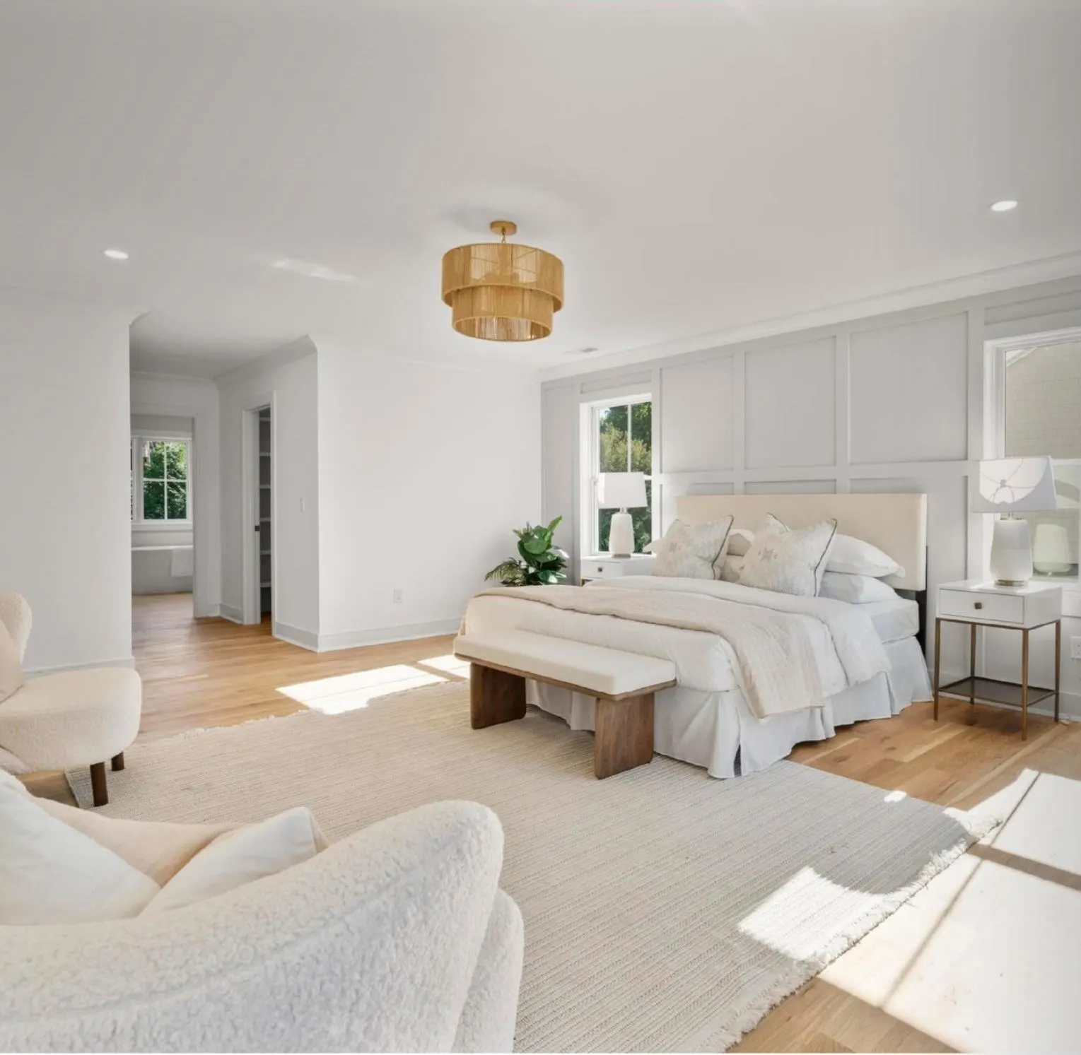 Bright primary bedroom with sitting area